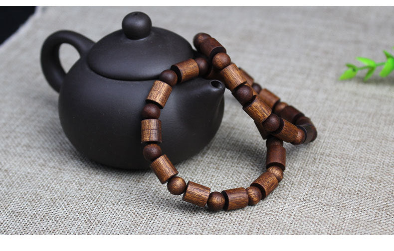 Factory wholesale black Qinan agarwood bracelets old medicine incense barrel beads double treasure bead bracelet wooden text play Buddha beads for men and women