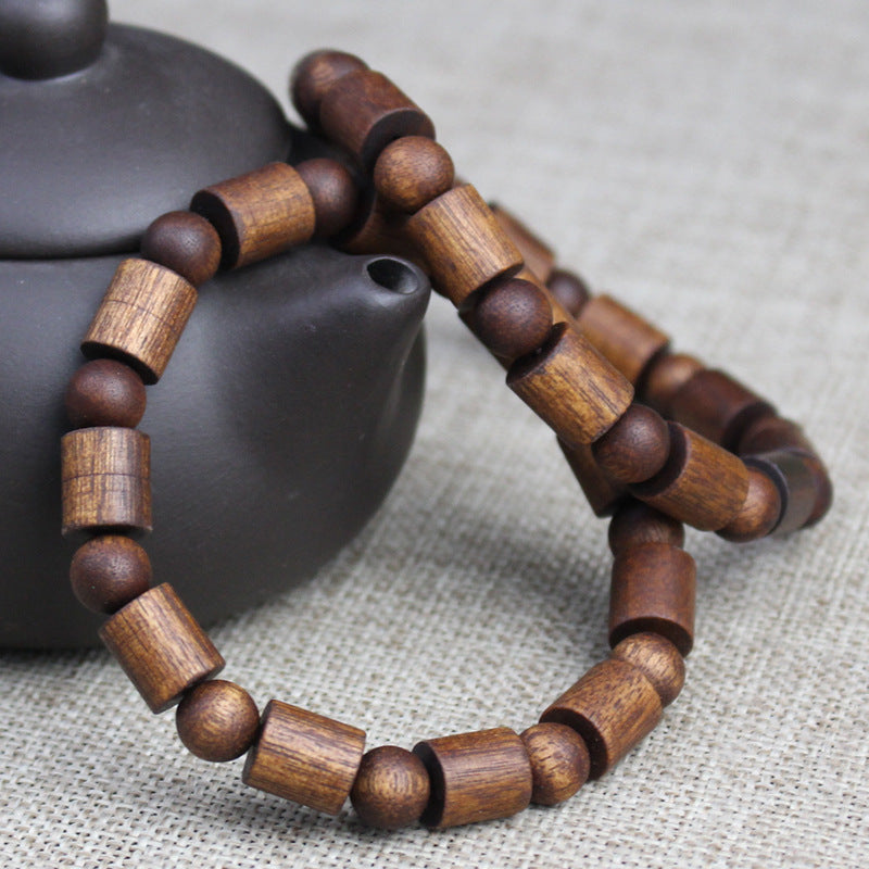 Factory wholesale black Qinan agarwood bracelets old medicine incense barrel beads double treasure bead bracelet wooden text play Buddha beads for men and women