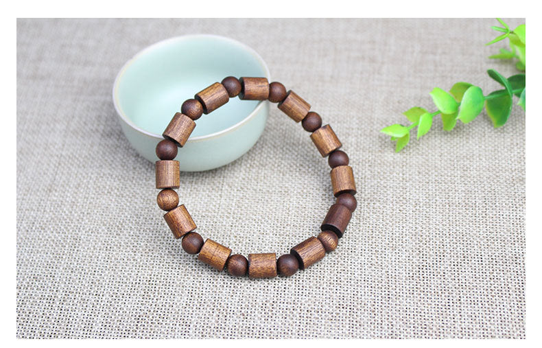 Factory wholesale black Qinan agarwood bracelets old medicine incense barrel beads double treasure bead bracelet wooden text play Buddha beads for men and women