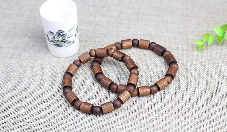 Factory wholesale black Qinan agarwood bracelets old medicine incense barrel beads double treasure bead bracelet wooden text play Buddha beads for men and women